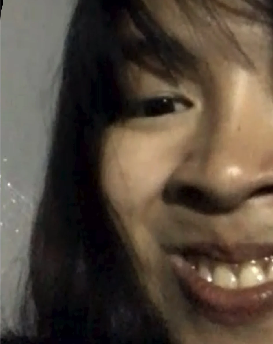 Gilly grinning in a funny close-up